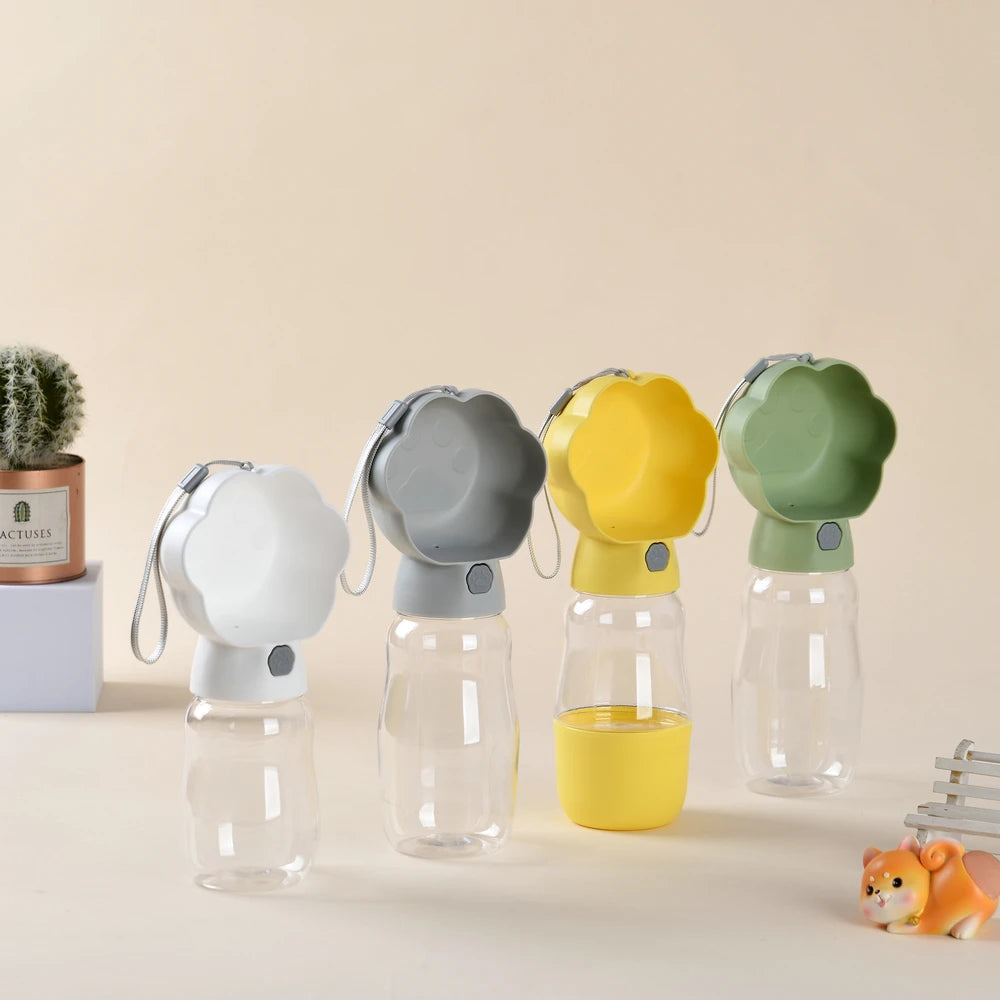 Botella de agua 2 en 1 para perros con recipiente para comida para perros pequeños y grandes, bebedero portátil para exteriores para cachorros y gatos.